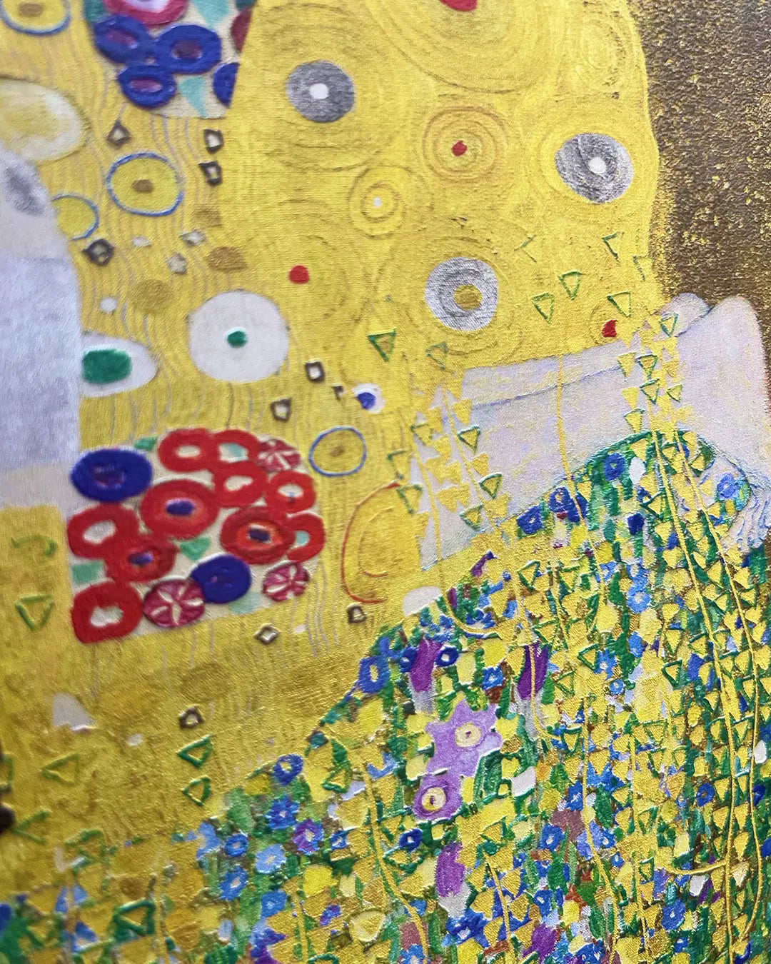 Artistic depiction of a couple embracing with floral elements, inspired by Gustav Klimt's style.